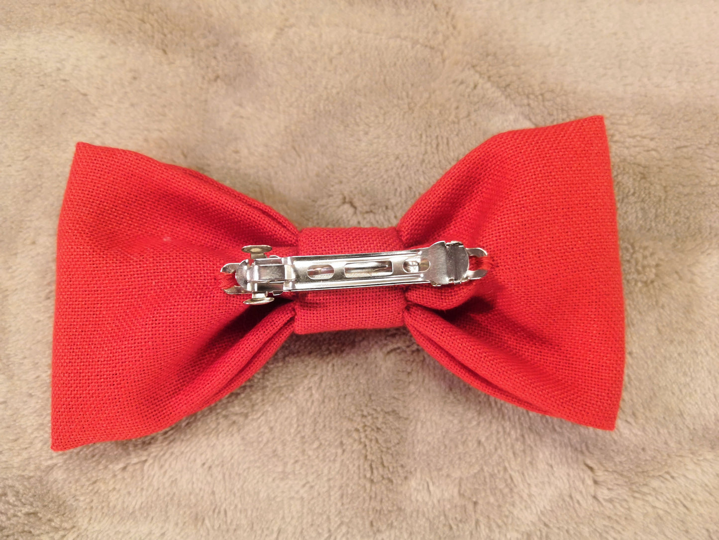 Red bow with black flower vine